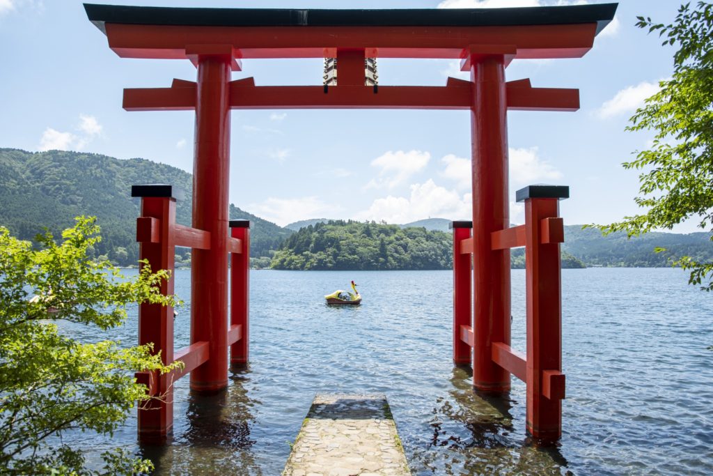 The torii gate of Hakone Shrine standing in Lake Ashi
