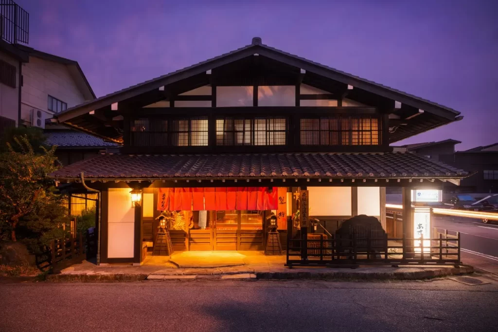 A traditional Japanese inn room with tatami flooring
